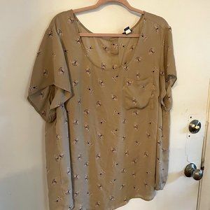 Loose-fitting blouse with moth pattern